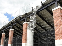 Damage to a concrete light poles at the high school football stadium. Another light pole on the other side of the stadium also collapsed ~ 511 kb